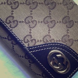 Gucci GG New Britt leather/canvas trifold wallet